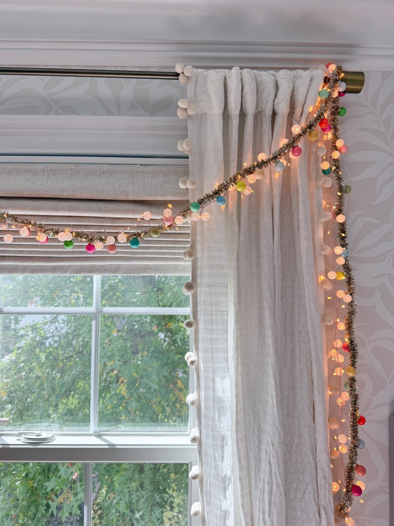 A little holiday magic for the girls’ room! I love the colorful globe lights draped around the window with the soft pom pom curtains. Such a fun way to make their bedroom feel festive without changing the rest of the decor.
colorful Christmas lights, girls room Christmas decor, holiday bedroom decor, globe string lights, pom pom curtains, kids Christmas decorations, festive window decor, Christmas garland, colorful holiday decor, girls bedroom ideas, holiday home decor, girlonthehudson