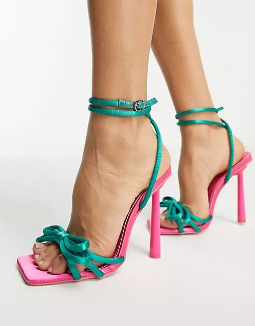 Public Desire x Paris Artiste Exclusive Lovegames contrast bow detail sandals in pink and green | ASOS (Global)