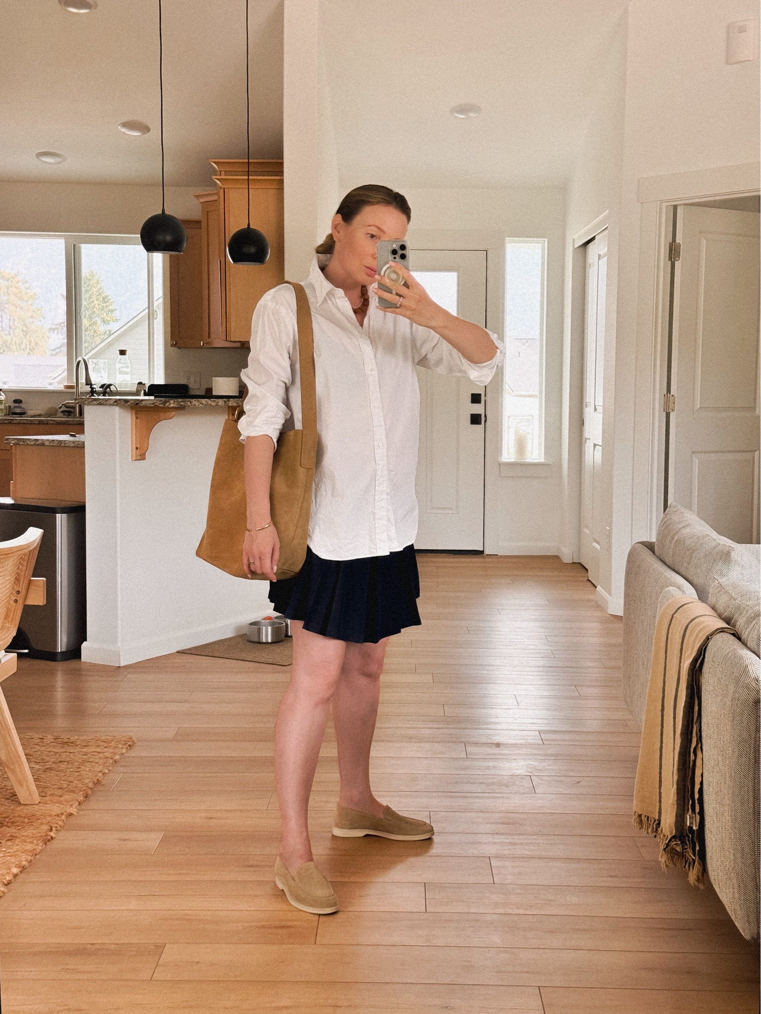 September feels like back to school for me regardless of my age so wearing a college inspired Fall outfit is like a second nature! 
Wearing Lacoste pleated tennis skirt + Polo Ralph Lauren oversized oxford button down shirt + Paul Green suede loafers + Madewell essential bucket tote. 

#LTKSeasonal #LTKFallSale #LTKSaleAlert