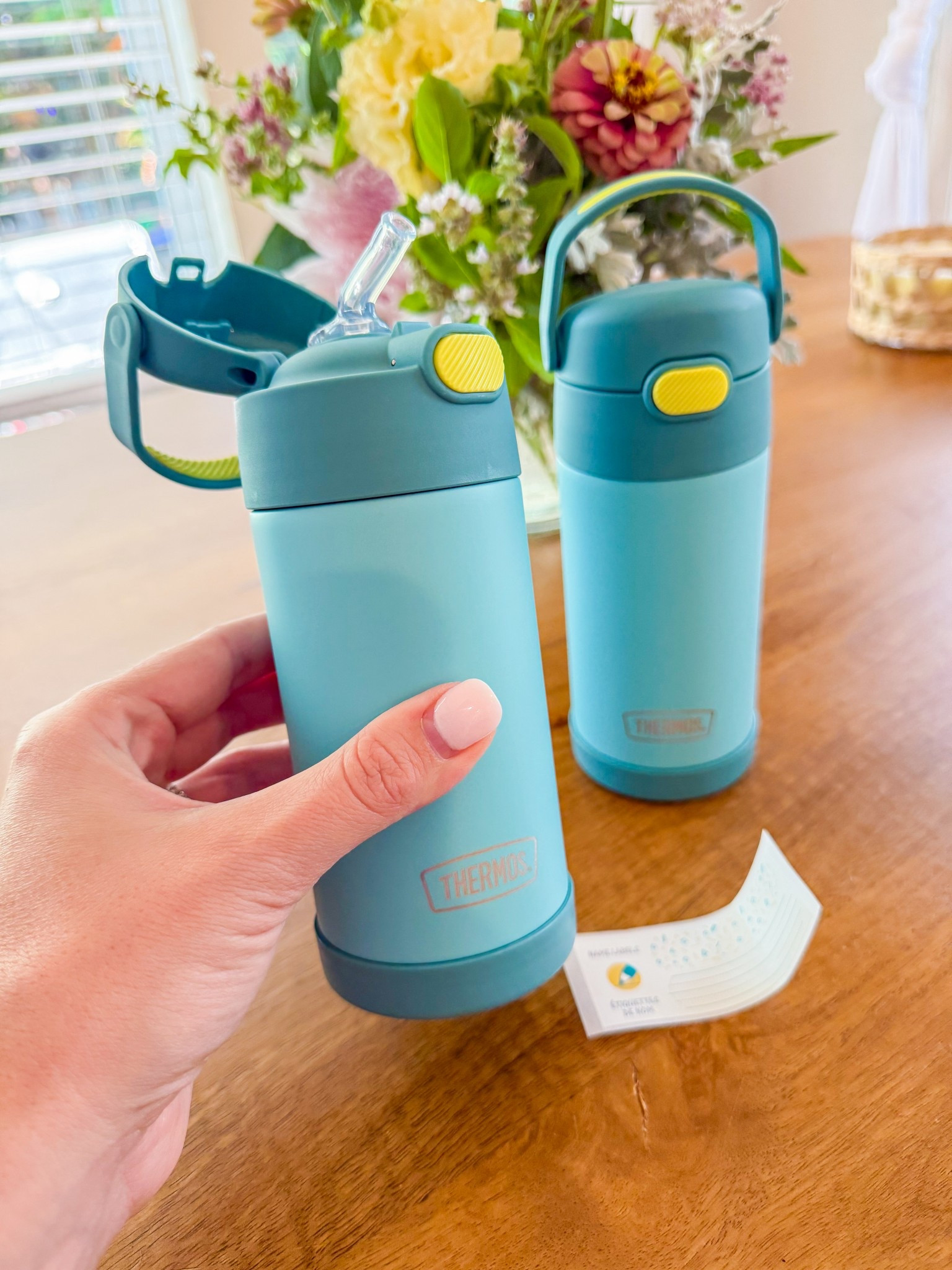 Thermos flip open straw water bottle 