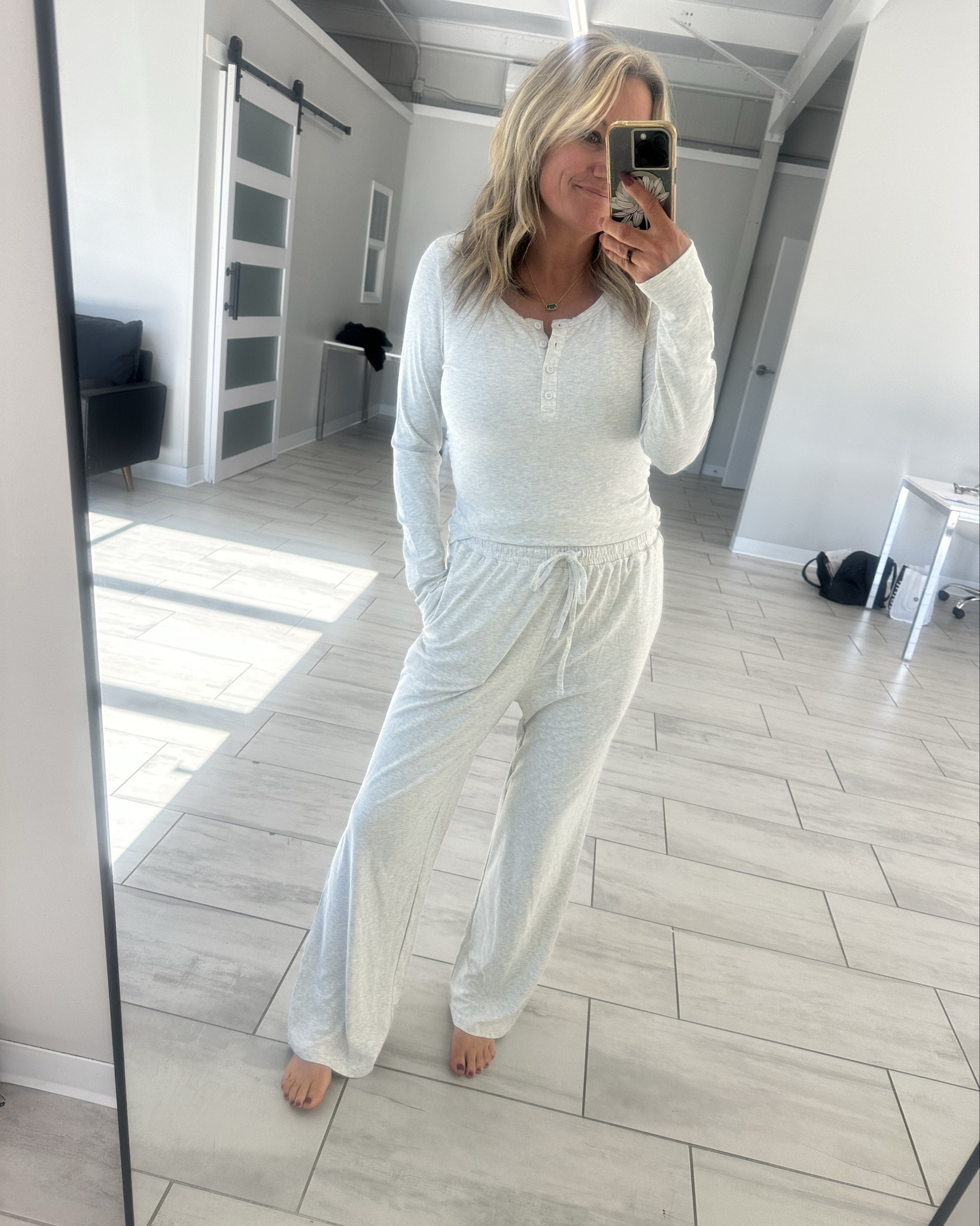 Loving these sets! The Henley neck, ruched sides, so comfy! Wearing a medium - fits TTS. Pockets, elastic waist, functional drawstringg

#LTKOver40