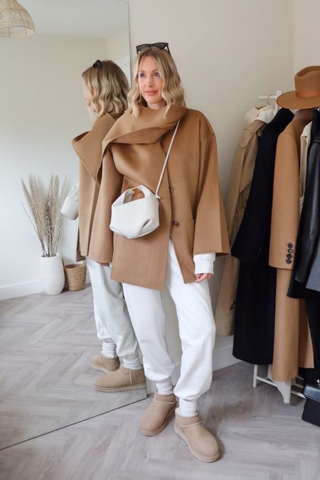 Casual Ugg boots outfit 

• Ugg ultra mini - Farfetch *10% off code: CHARLOTTEFF until Oct 31st
• Tracksuit - old - similar linked
• bag - polene Paris
• scarf coat - Toteme via Farfetch (discount code valid) and alternatives linked 

#uggboots #uggultramini #casual #camelcoat #scarfcoat #farfetchdiscountcode 

#LTKshoecrush #LTKstyletip #LTKSeasonal