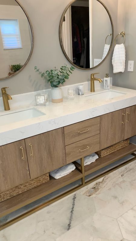 Bathroom decor.  Love my wood and gold accent bathroom vanity. Available in different sizes and also with black hardware. Wayfair sale

#LTKhome #LTKsalealert #LTKVideo