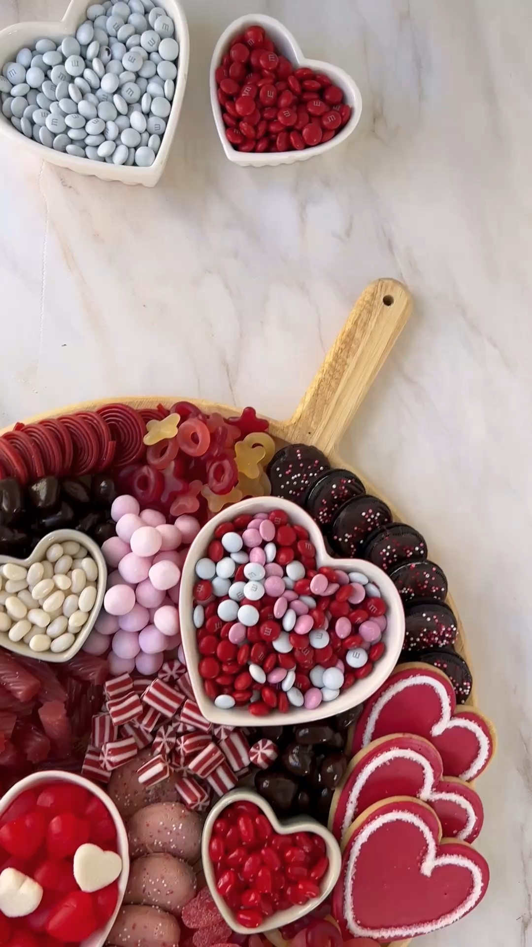 1️⃣ Choose a color palate that goes with the holiday. In this case, red, pink, white & chocolate brown is perfect for VDAY. For xmas I would use red, green and white. For Hannukah: blue, white and gold.

2️⃣ Use shaped ramekins. For VDAY, these heart ramekins are perfect. For 4th of July for example, you can use star ramekins.

3️⃣ Corral smaller candies in those ramekins to keep them in place.

4️⃣ Arrange larger cookies in fun and uniform patterns along the edge of the board/platter.

5️⃣ Fill in the rest of the holes with piles of other candies, making sure to alternate colors.

#ainttooproudtosweet #food52 #feedfeed#valentinesday #galentines

https://www.instagram.com/p/DF6vMuGxh6-/?hl=en

#LTKSeasonal #LTKParties #LTKHome