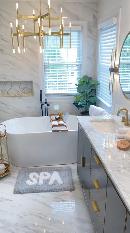 The before and after you have to see to believe! This bathroom makeover is still one of my favorite projects. Check out these bathroom vanities, lighting and decor finds to turn your space into a cozy yet luxe bathroom oasis!

#LTKsalealert #LTKhome #LTKfamily