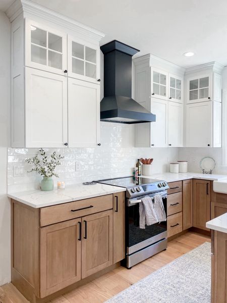Kitchen links! 

Uppers are dove white
Lowers are husk stain on maple wood
Backsplash is artisan frost ceramic tile from floor and decor with bright white grout

#LTKhome
