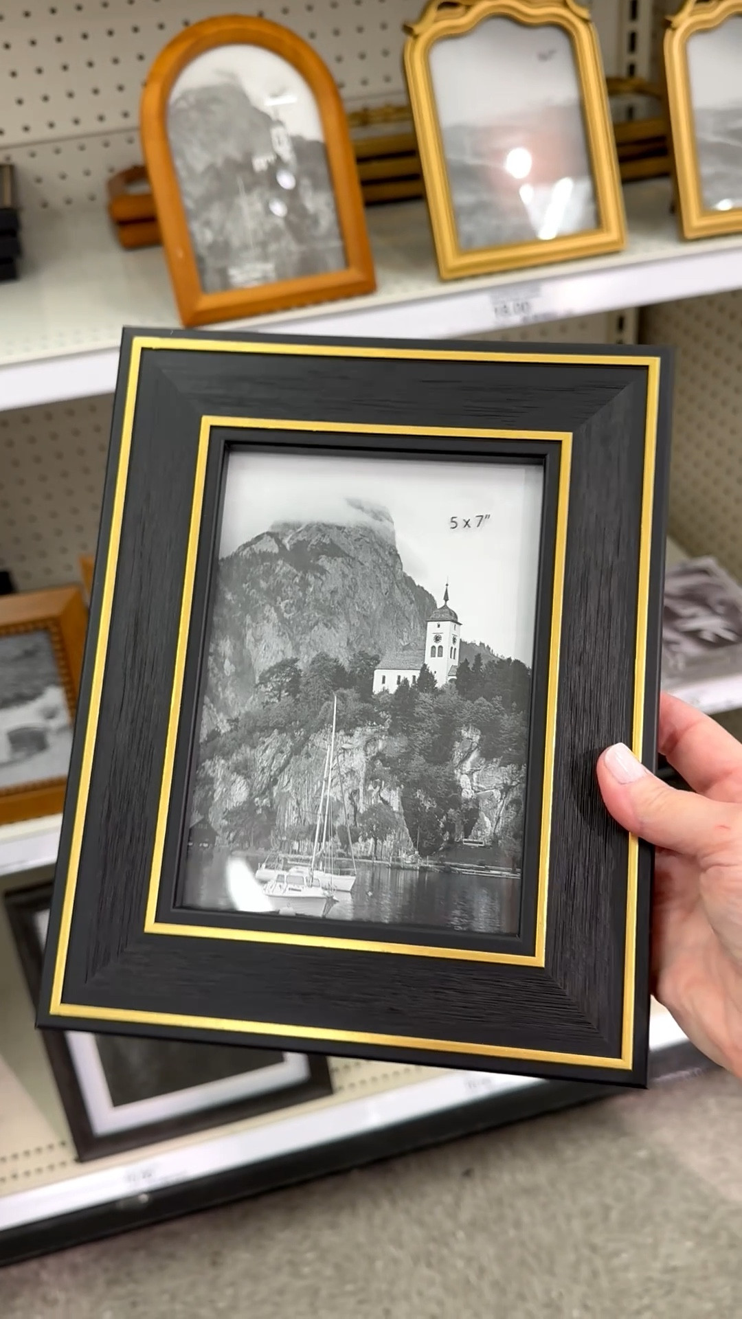 Black and brass go well together and it shows in this picture frame. ✨ This beauty has a 5x7 opening, easel back for table display, and a D-ring for wall mounting. It would be perfect for a side table, entryway, nightstand, or sideboard.

And if you’re a mosaic artist this would be a fun substrate to tile between the brass details. Tip: use thinner materials like stained glass or vitreous tile. For mosaic tips, tutorials + inspiration please visit my YouTube channel: YouTube.com/julieweilbacher, and follow @julieweilbacher on Instagram for all things mosaic art.

#pictureframe #blackandbrass #springhomedecor #tabletopframe #wallframe #target #5x7frame #mosaic #blackframe #woodframe #modernfarmhouse

#LTKHome