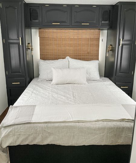 RV renovation master bedroom is moody and sophisticated.  

Target bedding.  Hearth and Hand quilt and throw.  Bamboo shade from Amazon.  Gold hardware pulls.  Modern gold industrial single sconces.  Amazon lighting.  

#LTKhome #LTKunder50