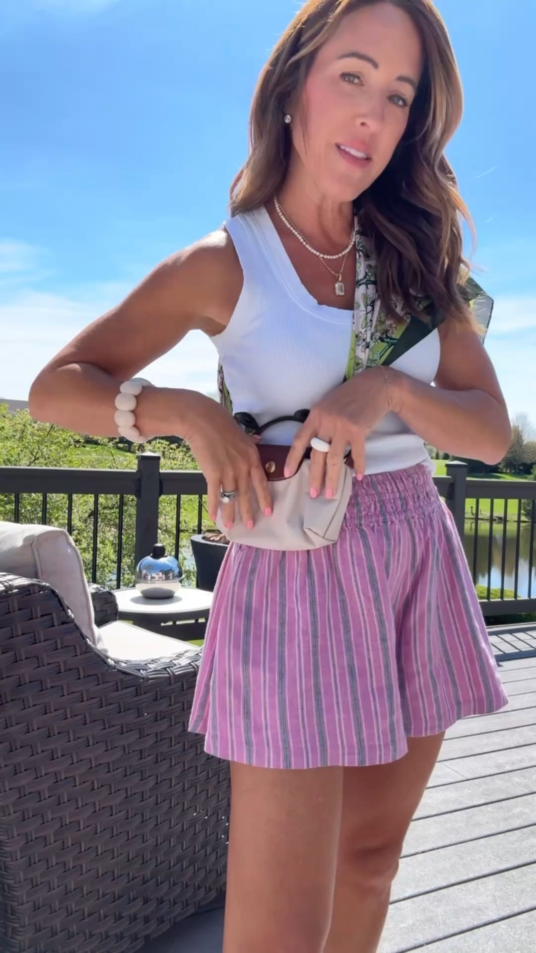 Add a pretty scarf to your bag to create a crossbody. 
Linking this bag and the Amazon version. 
XS shorts  

#LTKSeasonal #LTKmomlife