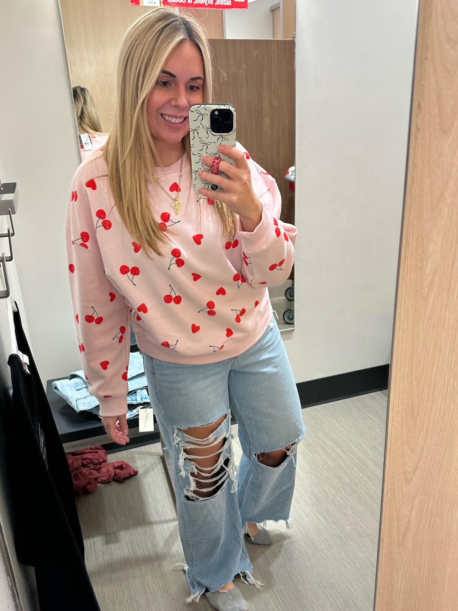 Sized down to a medium in the cherry sweatshirt and baggy jeans at my normal size 10. You could size up jn the top of you wanted a more oversized fit. Target Valentine’s Day clothes. Vday sweatshirt.

#LTKSeasonal #LTKMidsize