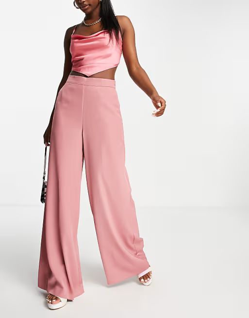 ASOS DESIGN - Broek met hoge taille en wijde pijpen in roze | ASOS (Global)