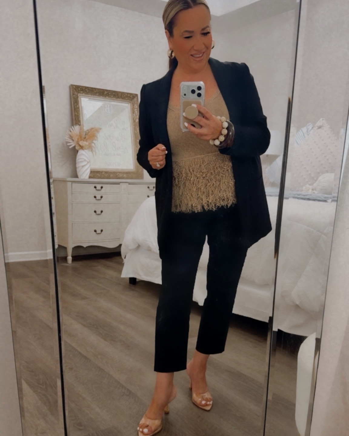 My #ootd A little black blazer and a touch of texture never fail. 

This look feels polished, feminine, and effortlessly put together—perfect for date night, dinner with friends, or when you simply want to elevate your everyday style.

The fringe detail on this top adds just the right amount of fun while the classic black blazer keeps everything timeless.

🤍 Shop this entire look on my LTK @allaboutastyle and follow for more elevated fashion finds, neutral style inspiration, and designer-inspired looks for less.

Would you wear this for work , date night or girls’ night out?