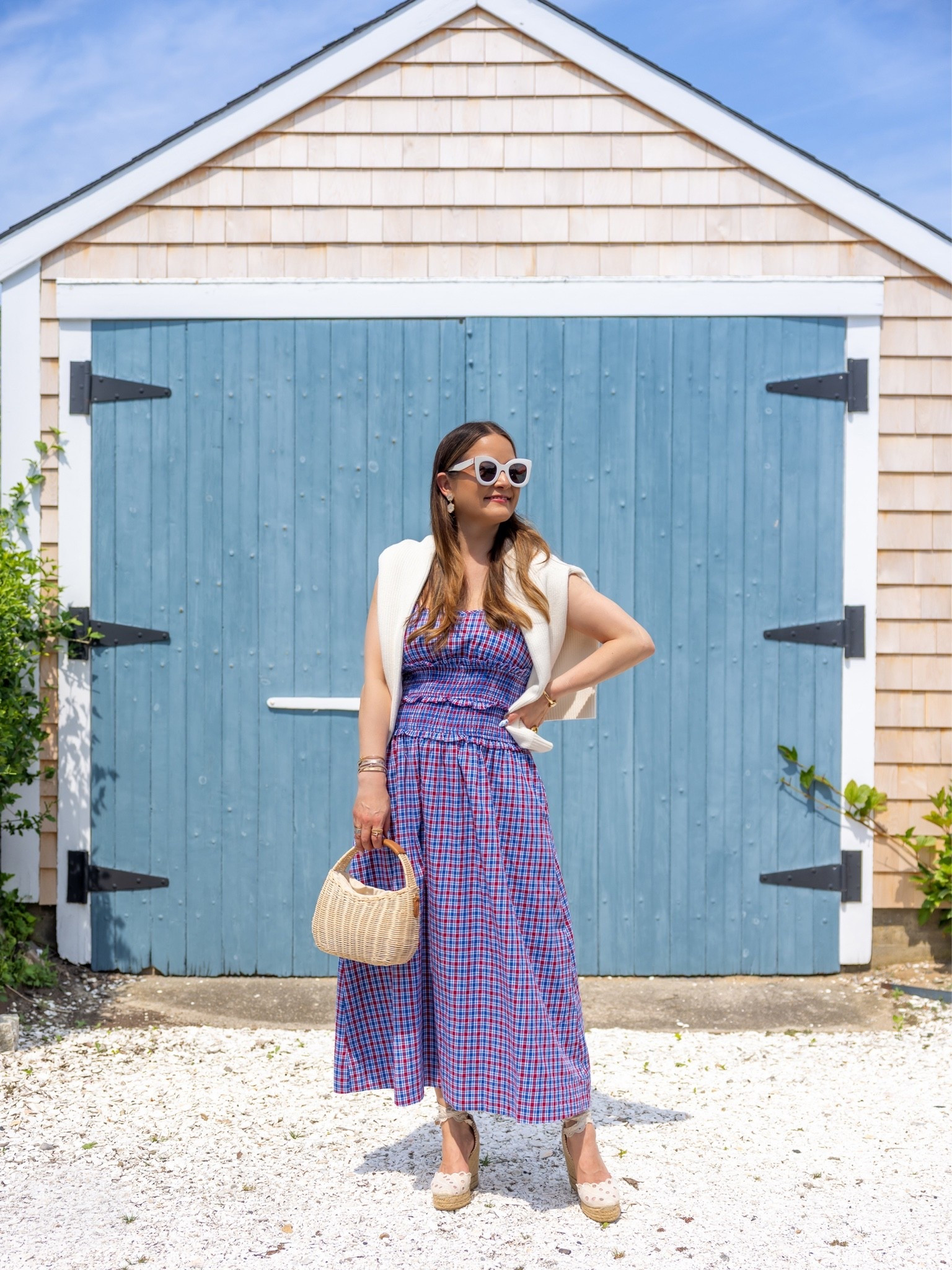 A red and blue smocked midi dress from Red Dress paired with a white cotton Cartolina sweater, Talbots wicker bag, and white embroidered espadrilles on Nantucket

#LTKootd #LTKSeasonal #LTKSaleAlert