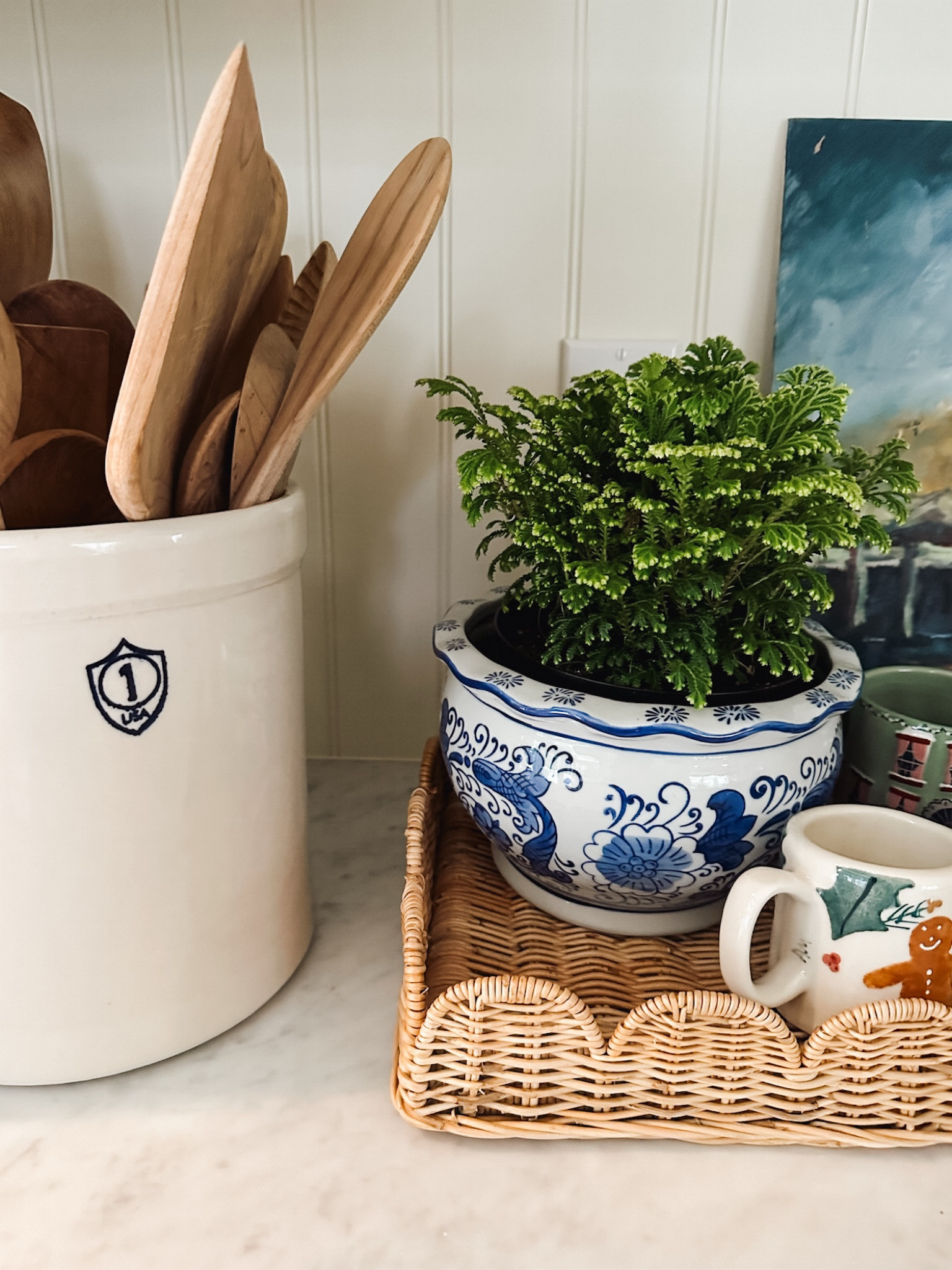 Scalloped wicker tray, utensil crock, blue and white planter pot 

#LTKHoliday #LTKHome #LTKGiftGuide