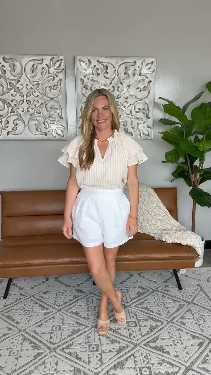 This neutral outfit is such a classic for summer. The striped flutter sleeve blouse feels light and feminine, while the crisp white shorts keep the look fresh and polished. It’s the perfect combination of comfortable and elevated for everything from brunch to vacation dinners and summer events.

Flutter sleeve blouse, White shorts outfit, Summer style, Neutral outfit inspiration, Dressy casual look, Vacation outfit, Summer brunch outfit, Feminine fashion, Lightweight summer top, Classic summer style, Chic everyday outfit, Boutique fashion, audriedollins

#LTKootd #LTKSeasonal #LTKOver40