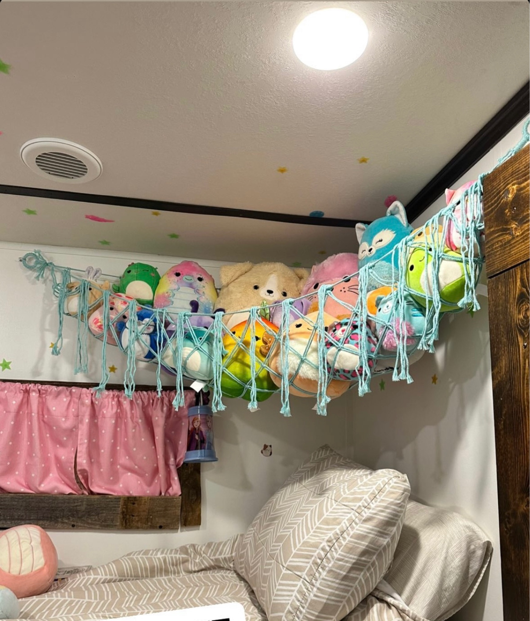 With the amount of Squishmallows we have this corner net has been amazing! It has held so well and we have no worries with it being right above the headspace. Even it it was to fall it’s stuffed animals. Perfect for our RV or small spaces! This makes a great Christmas/Birthday gift with nine different colors!

#LTKkids #LTKhome #LTKGiftGuide