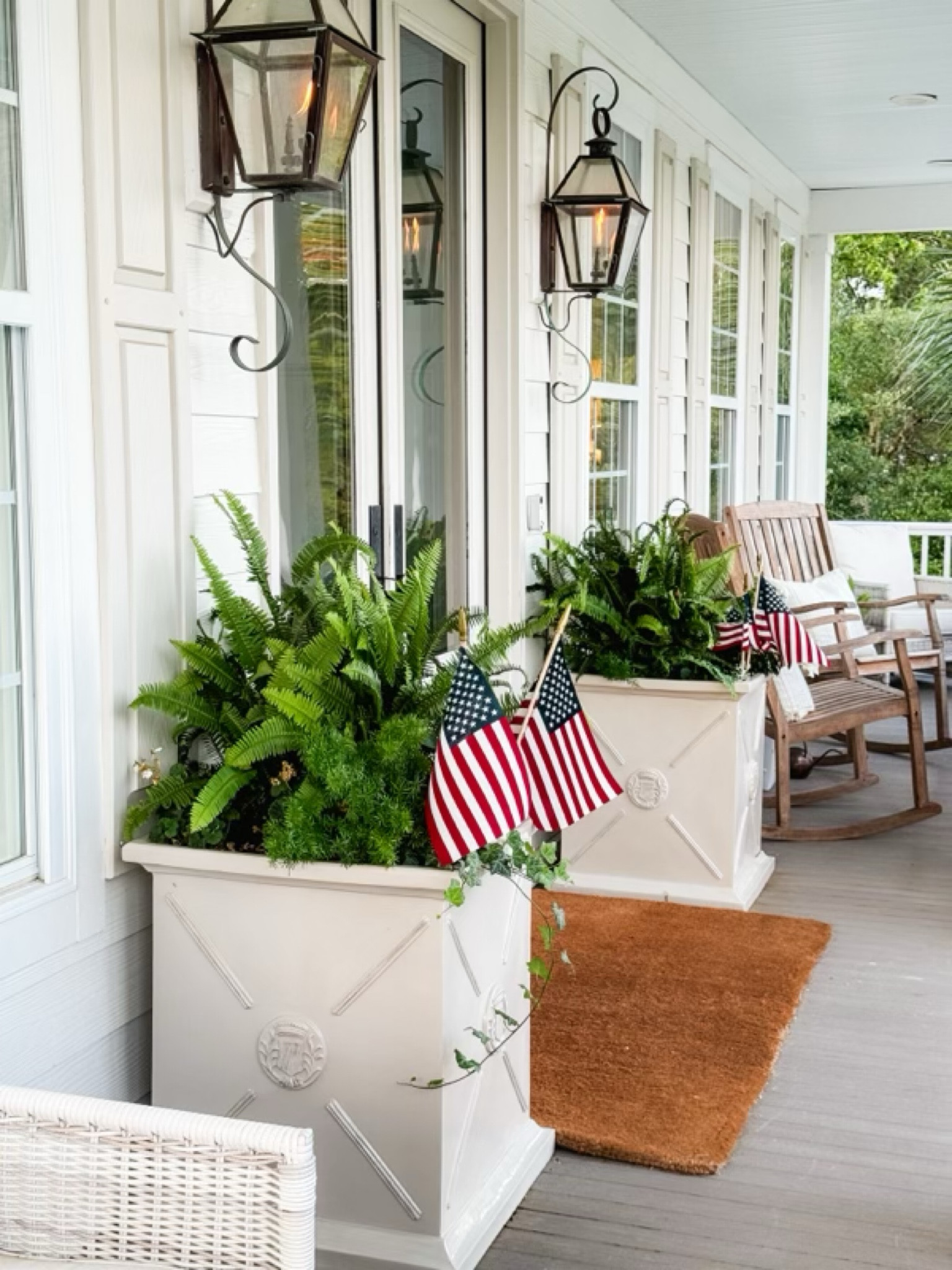 Happy Fourth of July week! Let this give you inspiration for your summer porch! Love the way these planters look with the flags! 

#LTKHome #LTKSummerSales #LTKSeasonal