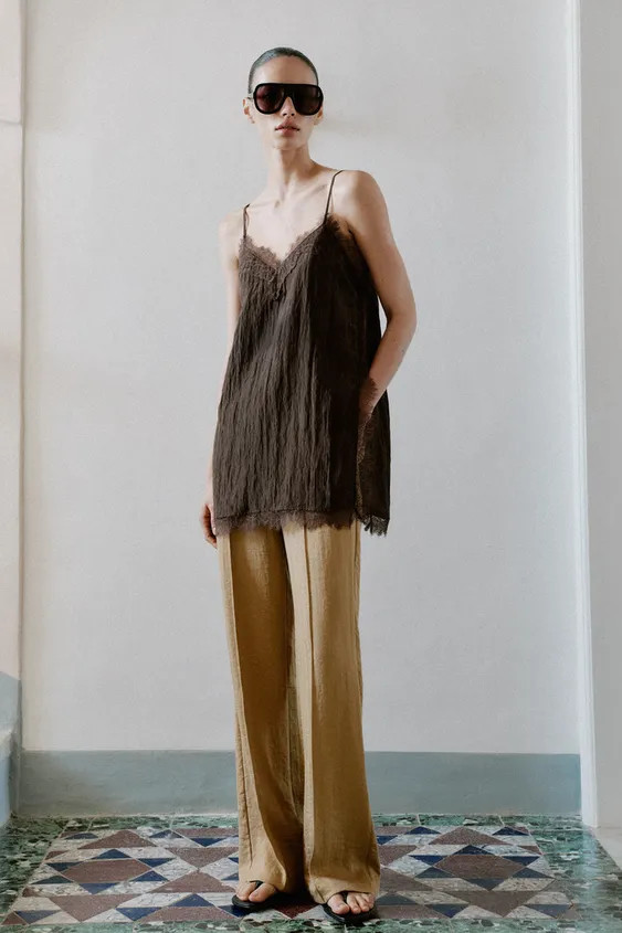 V-neck top with adjustable thin straps. Features a crinkled effect fabric and lace trim. | Zara UK