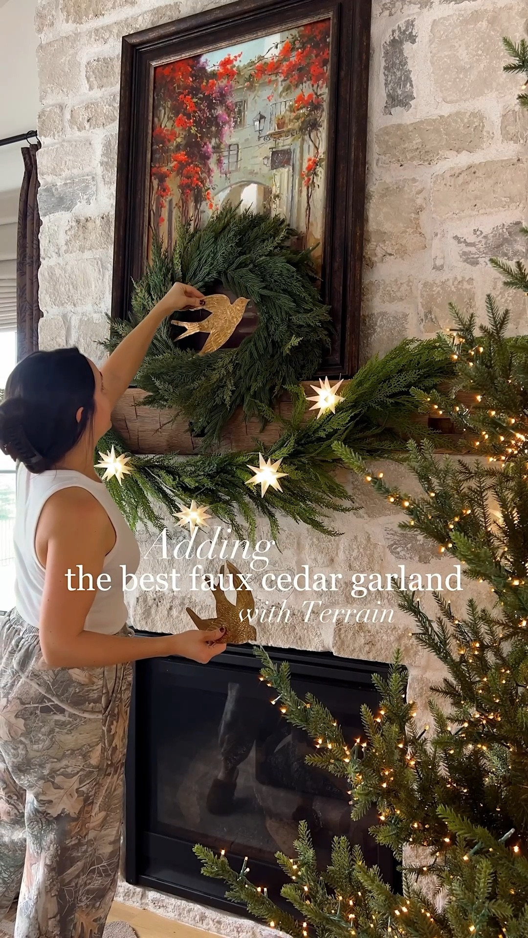 Adding my favorite faux cedar Christmas garland to our mantle! Terrain‘s some of the best Christmas decor there is, including this garland, Christmas trees, and this beautiful mixed cedar faux wreath! Get it while you can before it sells out before the holidays! #terrainpartner 

#LTKSeasonal #LTKHome #LTKStyleTip