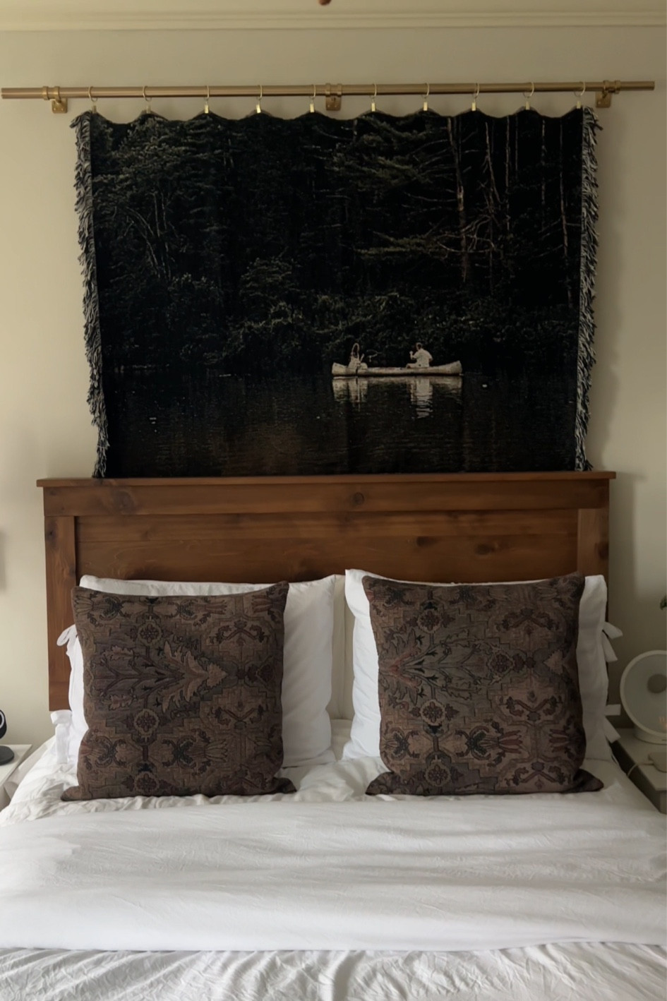 Makeshift tapestry with your own photo! I had this photo from our engagement shoot turned into a blanket then hung it on a curtain rod with curtain hooks to make it a piece of art!

My bedding is holding up so well and is so cozy! Feels like a hotel which is what we were going for!

#LTKfindsunder100 #LTKfindsunder50 #LTKhome