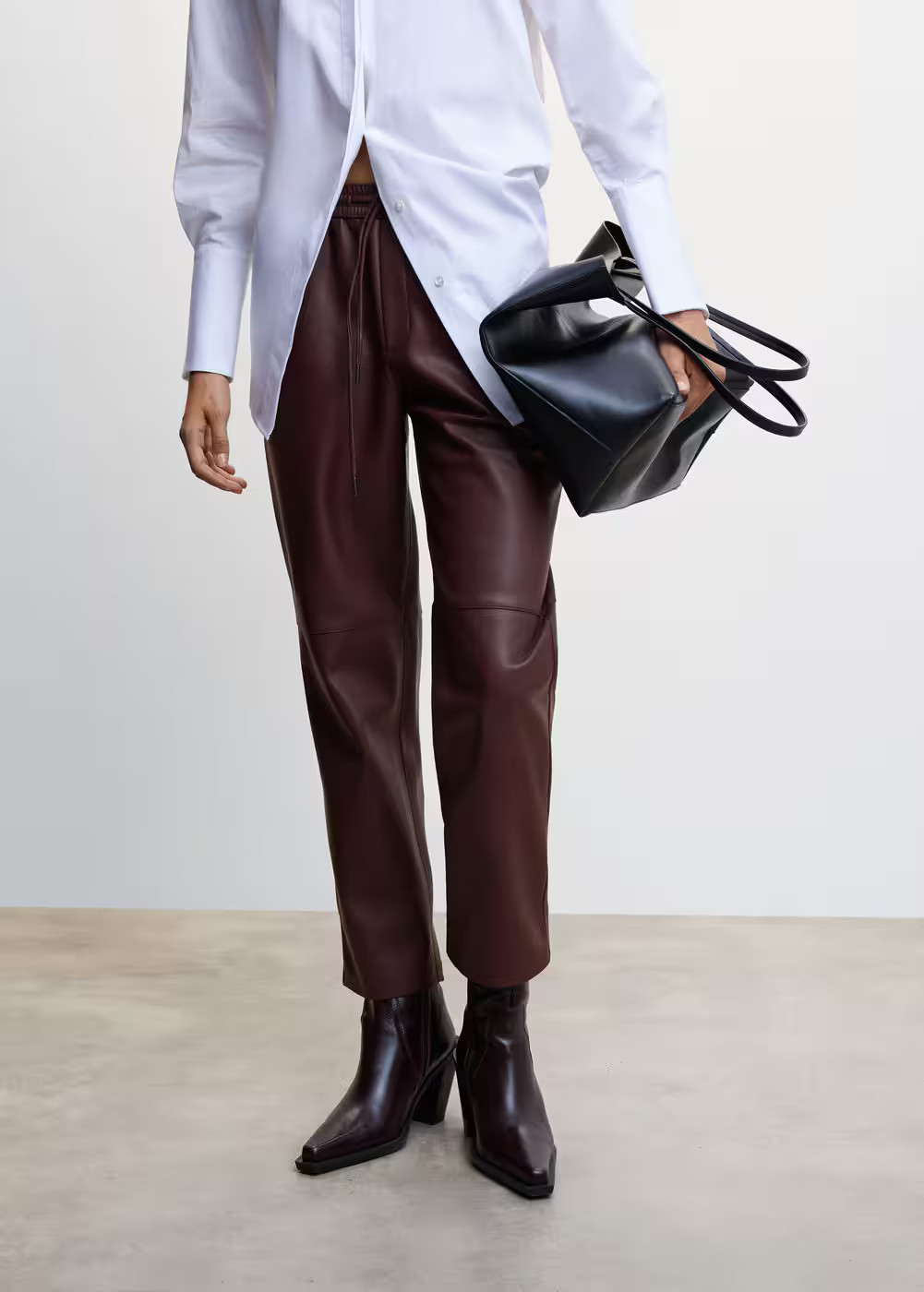 Leather-effect elastic waist trousers -  Women | Mango USA | MANGO (US)