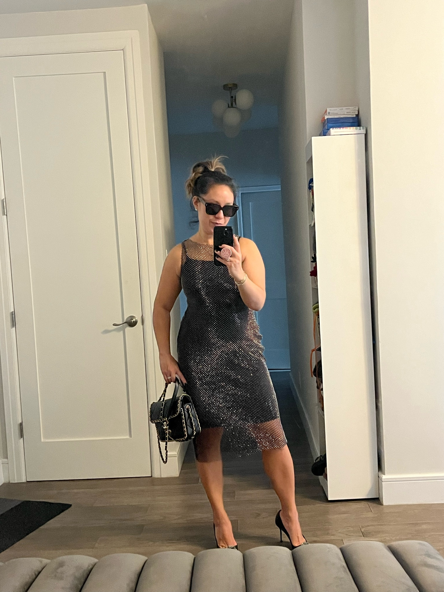 I spent all my money on accessories so here we are. Holiday dress. Looks expensive, but it’s not. Fully lined. No zippers. It’s a pullover fit, so has stretch. The materiał is a rhinestone mesh. I’m wearing a size xxs. I’m 5’2” for reference. 

#LTKCyberWeek #LTKParties #LTKHoliday