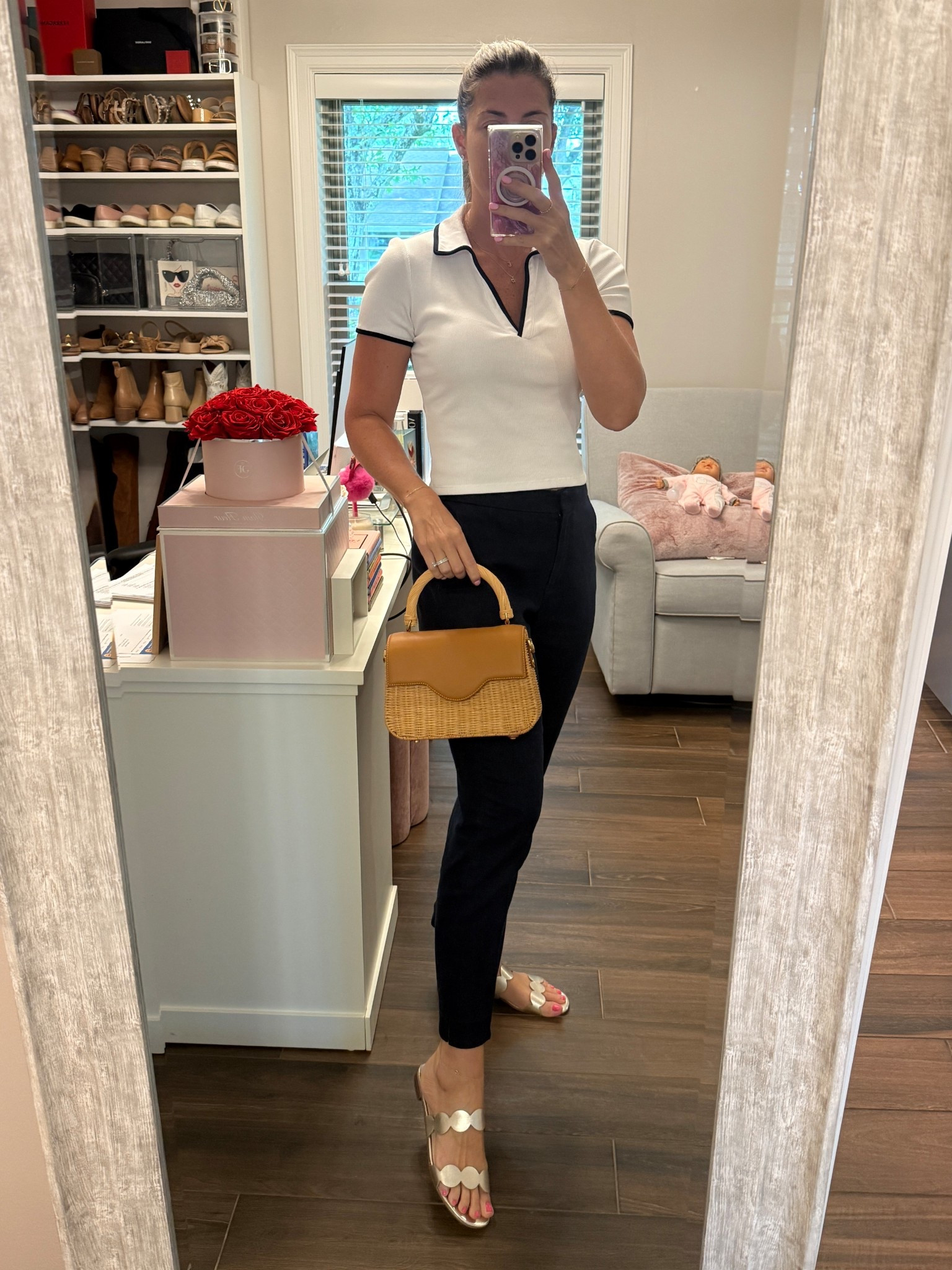 A simple outfit formula for summer can is a cotton or linen blend pant (I prefer a more tapered fit for a polished look) plus a cropped collared tee like this one which is casual yet elevated. (The pants should be high waisted so your midriff is not exposed.) I finished it with a gold flat sandal because metallic will always feel dressy and a straw bag which is the perfect summer neutral.

Shirt runs TTS. Wearing size S. (This style comes in about 6 colors, some of which are on sale!)
Pants are old but linking similar option. 
Sandals run TTS. 

#LTKOver40 #LTKSaleAlert #LTKItBag