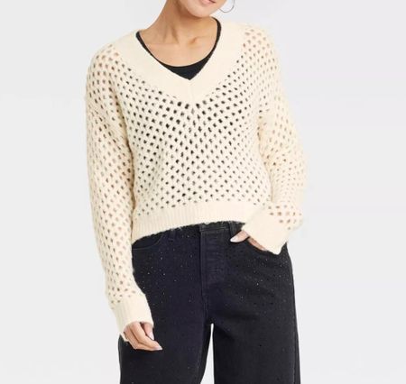 Look how cute this sweater is!! It comes in pink and black too. It’s a perfect transition sweater for Spring. 

#LTKfindsunder50
