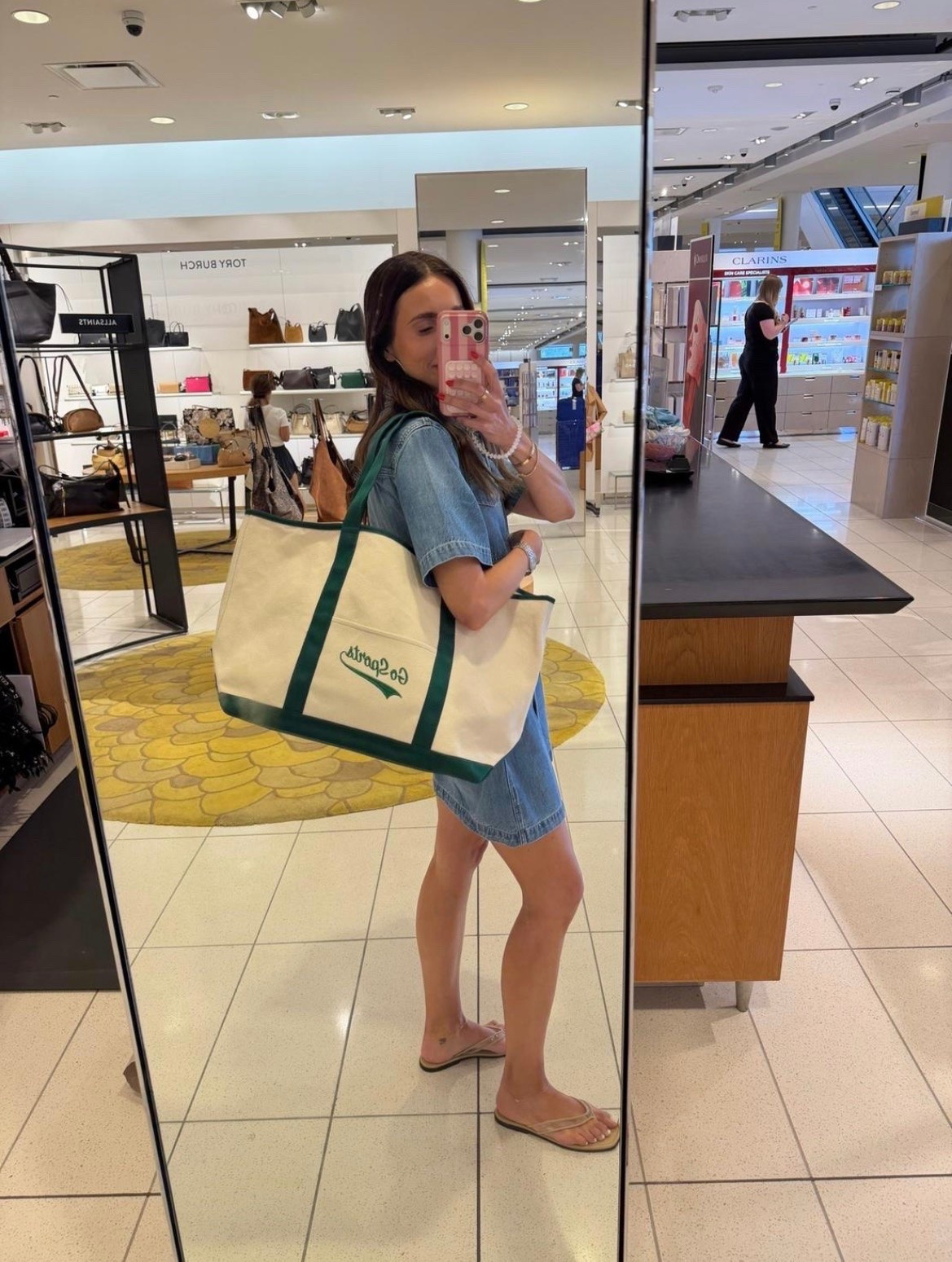I underestimated how much I would use an oversized tote until I found one that could hold my laptop, water bottle, beauty bag, and everything else that somehow gets handed to me. The sturdy canvas keeps its shape, the green trim gives it a sporty finish, and it is roomy enough for travel days, errands, or a full afternoon out.

oversized canvas tote, green trim bag, roomy everyday tote, travel bag, carryall tote, weekend bag, practical accessories, denim dress outfit, casual summer style, large shoulder bag, annabrstyle

#LTKTravel #LTKmomlife #LTKdayinmylife