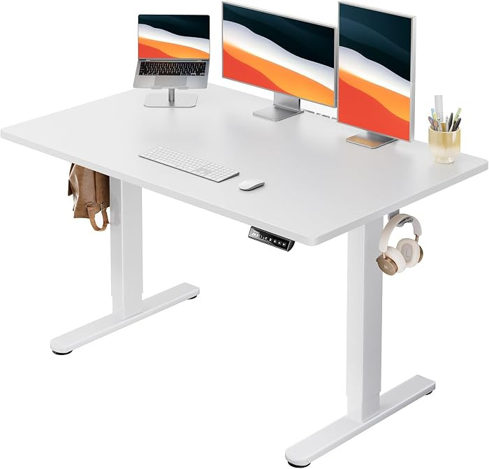 HUANUO Electric Standing Desk, 48" x 30" Whole Piece Desktop, Adjustable Height Computer Desk, 4 ... | Amazon (US)