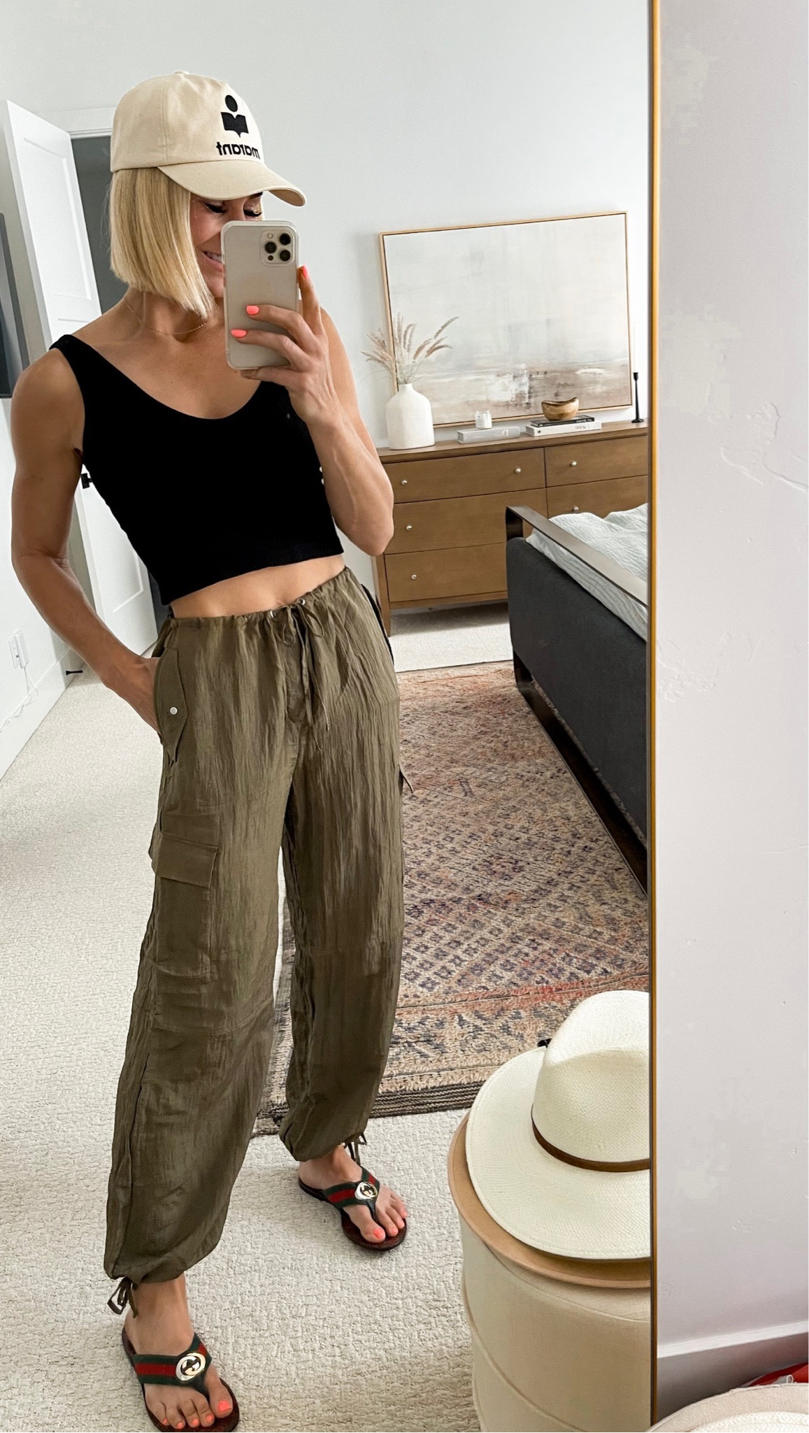 Summer style.
H&M Cargo pants, my go to crop tank, Isabel marant baseball hat, Gucci sandals 
Wearing size S in pants & size m/l in tank

#LTKunder50 #LTKSeasonal #LTKFind