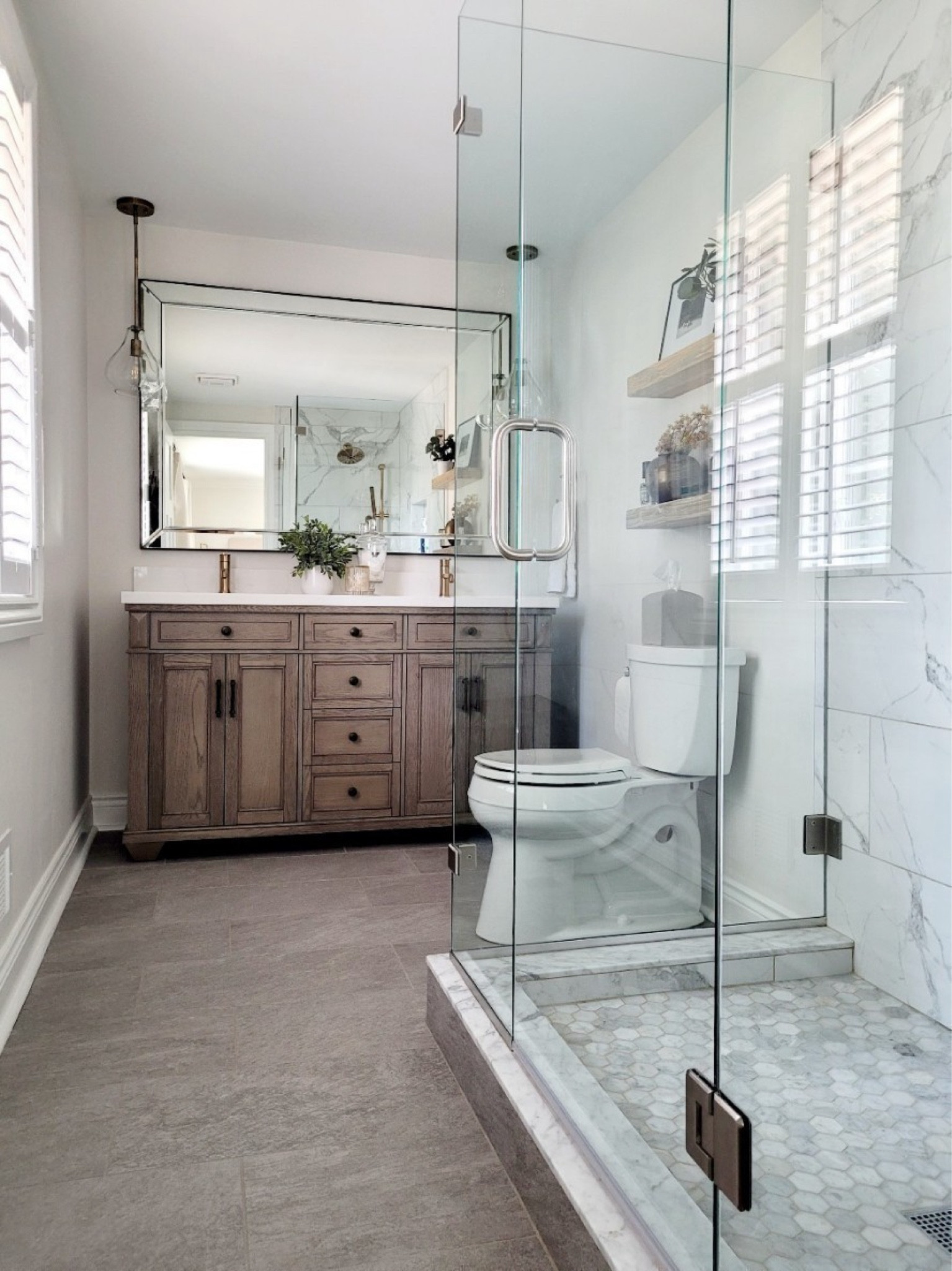Primary bathroom inspo -I’m definitely team mixed metals in bathrooms and kitchen faucet and finishes! marble bathroom, bathroom decor, shower tile, bathroom tile, bathroom shelf styling, double vanity, Home Depot, 

#LTKStyleTip #LTKHome