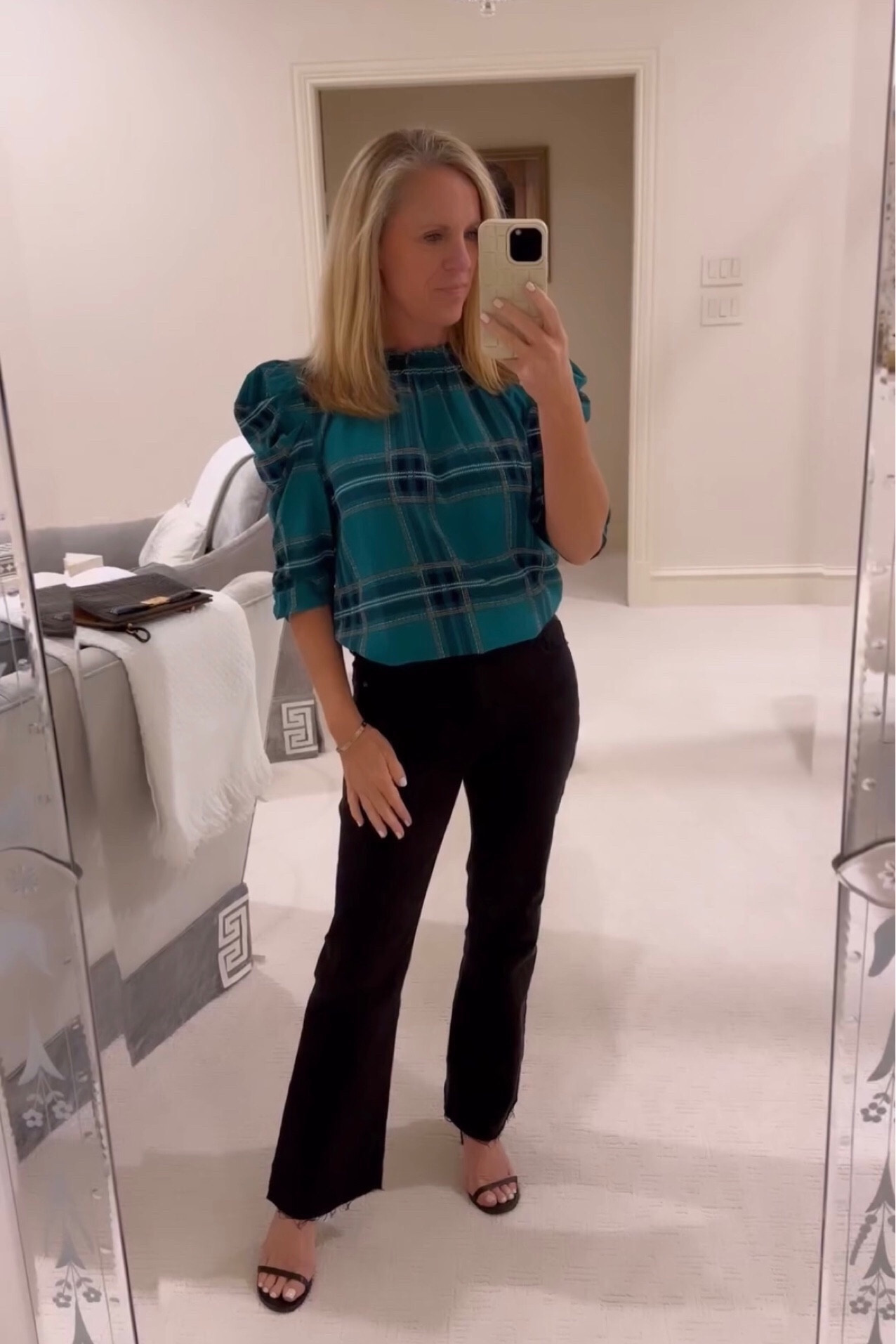 Darling emerald green, tartan plaid blouse with puff sleeves
Best most flattering black denim with raw hem
Black heel sandals 
Casual holiday party look 
Girls night out


#LTKSeasonal #LTKstyletip #LTKover40