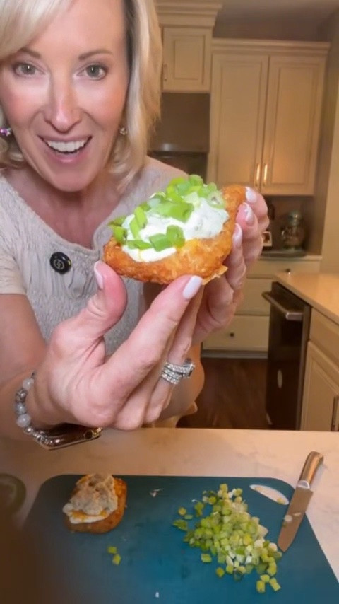If you love a loaded baked potato like me, you need to try this recipe! 🥔🧀 These Loaded Hash Browns are great to make when you want something delicious without spending hours in the kitchen. This crispy appetizer is easy to customize, comes together in just a few ingredients, and will be such a hit with guests! 😋

Check out this recipe and all the details on my monochromatic look from Tara Time below! 

Loaded Hash Browns 

Ingredients:
-1 package of frozen hash brown patties 
-1/2 cup dill dip
-1 cup shredded cheddar cheese
-1/2 cup sour cream
-2 green onions, thinly sliced
-optional: 4 slices of bacon, cooked until crispy and diced

Directions
1. Bake the hash brown patties according to the package directions until golden brown and crispy.
2. Spread about 1 tablespoon sour cream over each hash brown patty.
3. Sprinkle the cheddar cheese evenly over the top of the hash browns (about 1½ tablespoons per patty).
4. Set oven temperature to 400°F and return the hash browns to the oven for 7–10 minutes, or until the cheese is melted.
5. Remove from the oven and sprinkle the diced bacon evenly over the melted cheese.
6. Add a dollop of the dill dip (about 2 teaspoons per patty) and sprinkle sliced green onions and bacon (if making a non-vegetarian version) on top. 
7. Serve while warm and enjoy!

#LTKfoodie #LTKHome #LTKSeasonal