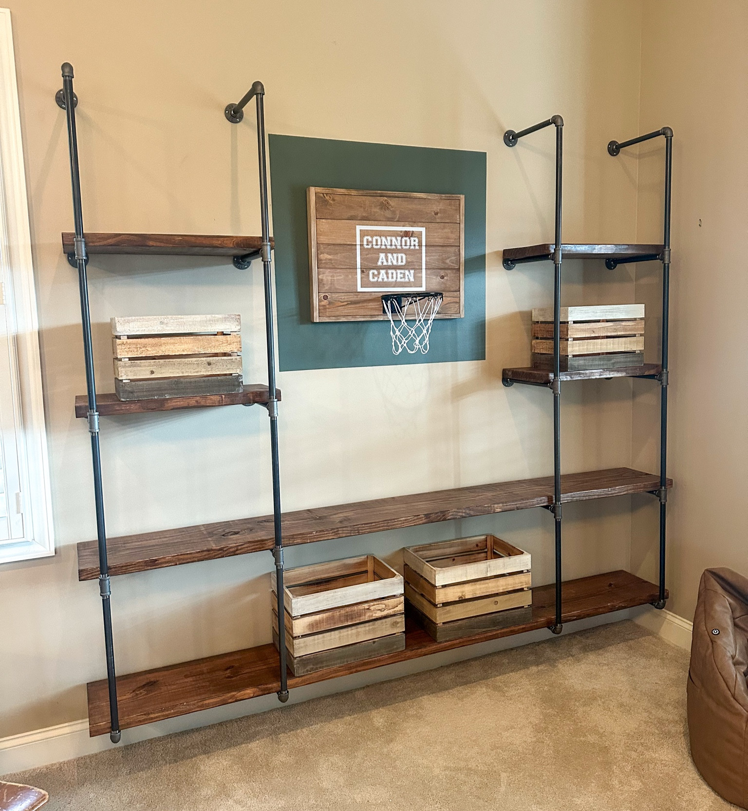 A fun and functional storage wall for young kids! The hoop is customizable and the perfect accent for this project!

#LTKKids #LTKHome