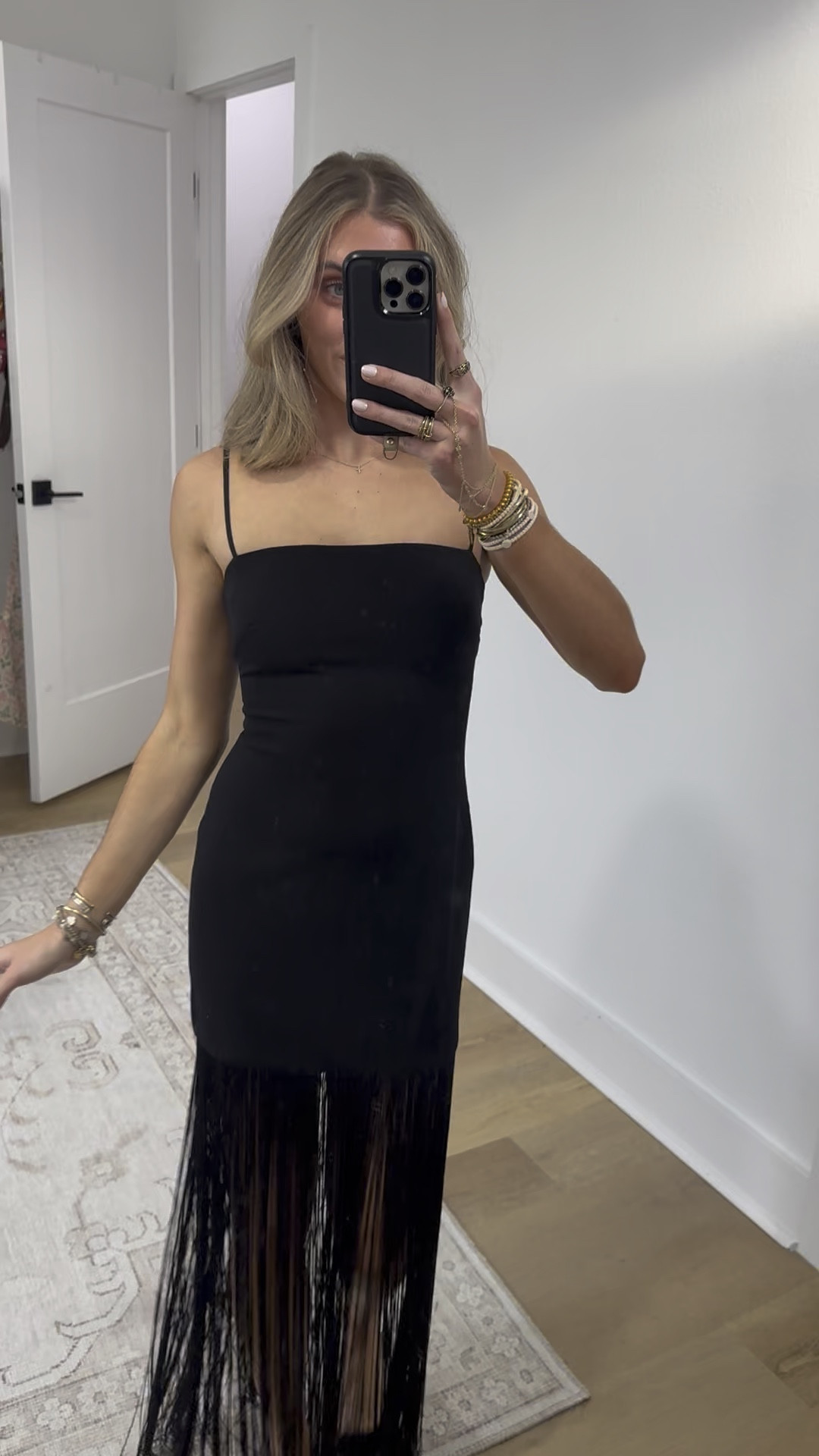 Showpo size 2. With a sleek shift silhouette and swingy tassel detailing, it’s made for dance floors, rooftop bars and every RSVP in between. Styled in classic black, it nails the Dresses brief with a minimal shape and high-impact texture, think fashion-girl polish with a playful twist.
Evie Maxi Dress - Crepe Fringed Shift Dress In Black serves flirty drama with every step, tapping into Fringe energy and pairing perfectly with pendant necklaces for a chic finish. Add strappy heels and a compact clutch to elevate the vibe, or lean into a cool-girl edge with cowboy boots when you want unexpected contrast. Effortless, versatile and ready for the spotlight.

#LTKWedding #LTKootd #LTKFindsUnder100