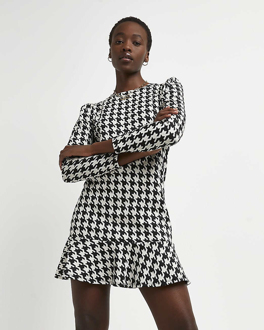Black dogtooth peplum hem mini dress | River Island (UK & IE)