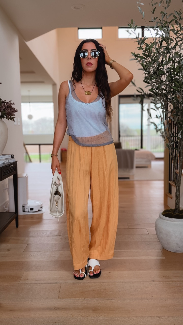 Wearing a small in this sheer metallic blue gray tank top from Zara, wearing a small in this ribbed white tank bodysuit, wearing an extra small and these baggy orange pants from Zara, Zara bag in Amazon accessories. The perfect spring look!

#LTKOver40 #LTKTall #LTKootd