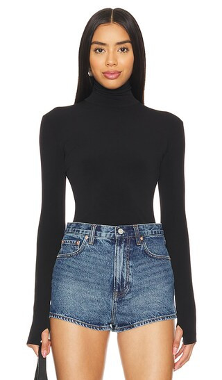 Norma Kamali Slim Fit Long Sleeve Turtleneck Top in Black. - size M | Revolve Clothing (Global)