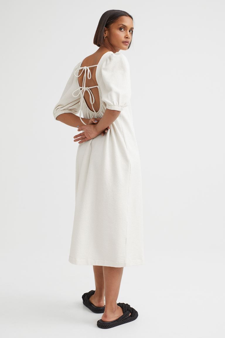 Calf-length dress in waffled jersey made from a cotton blend. Low-cut back with horizontal ties a... | H&M (UK, MY, IN, SG, PH, TW, HK)