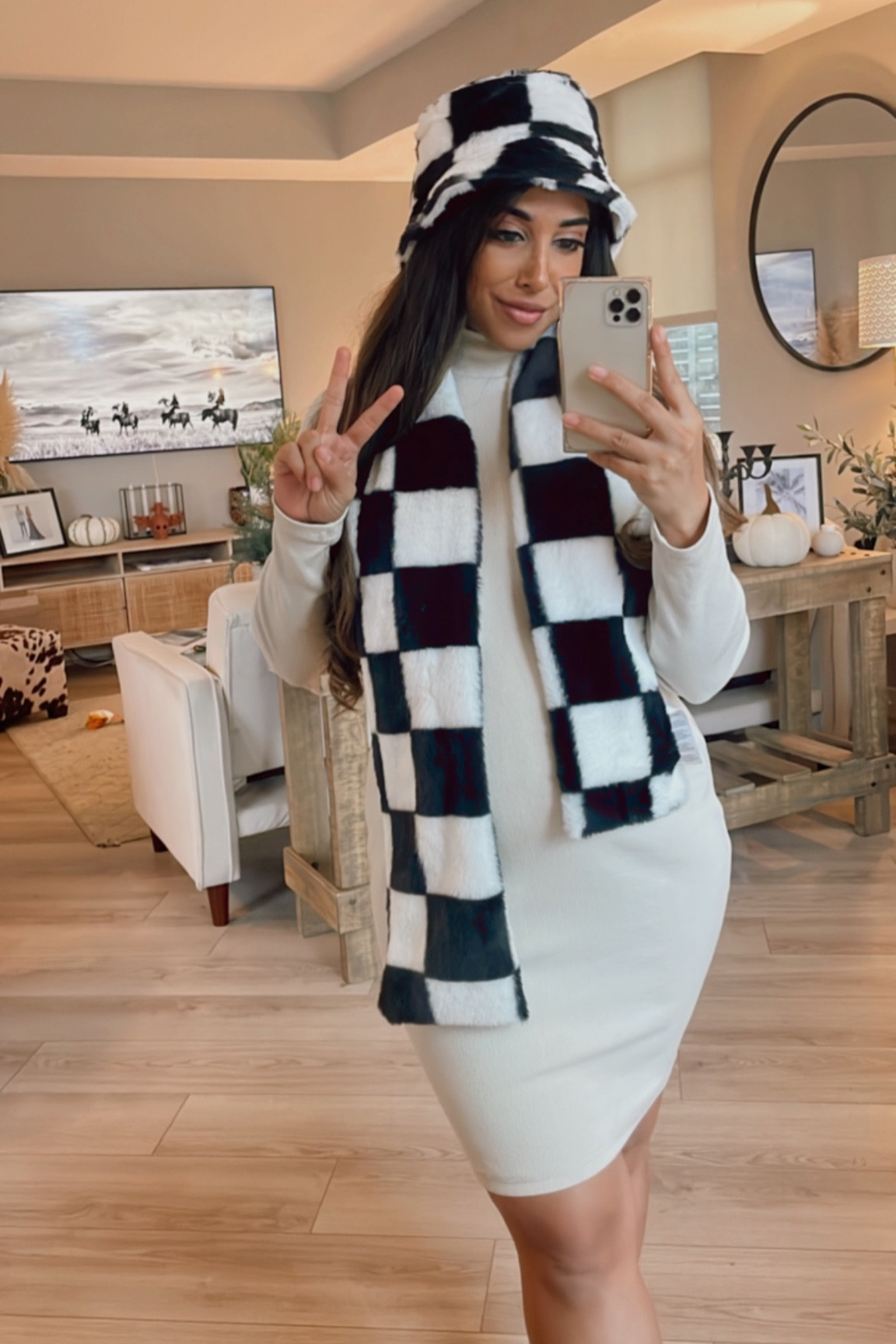 Checkerboard scarf and matching bucket hat trending now! 

#LTKHoliday #LTKSeasonal #LTKstyletip