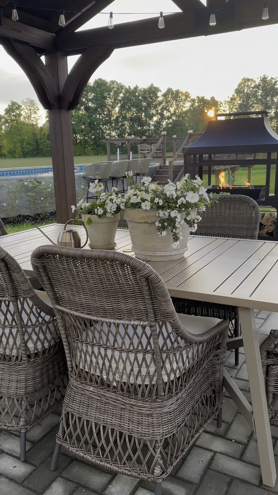 Outdoor living / patio furniture / outdoor fireplace / patio design / backyard / dining table / dining chairs / gazebo 

#LTKHome #LTKSeasonal #LTKWatchNow