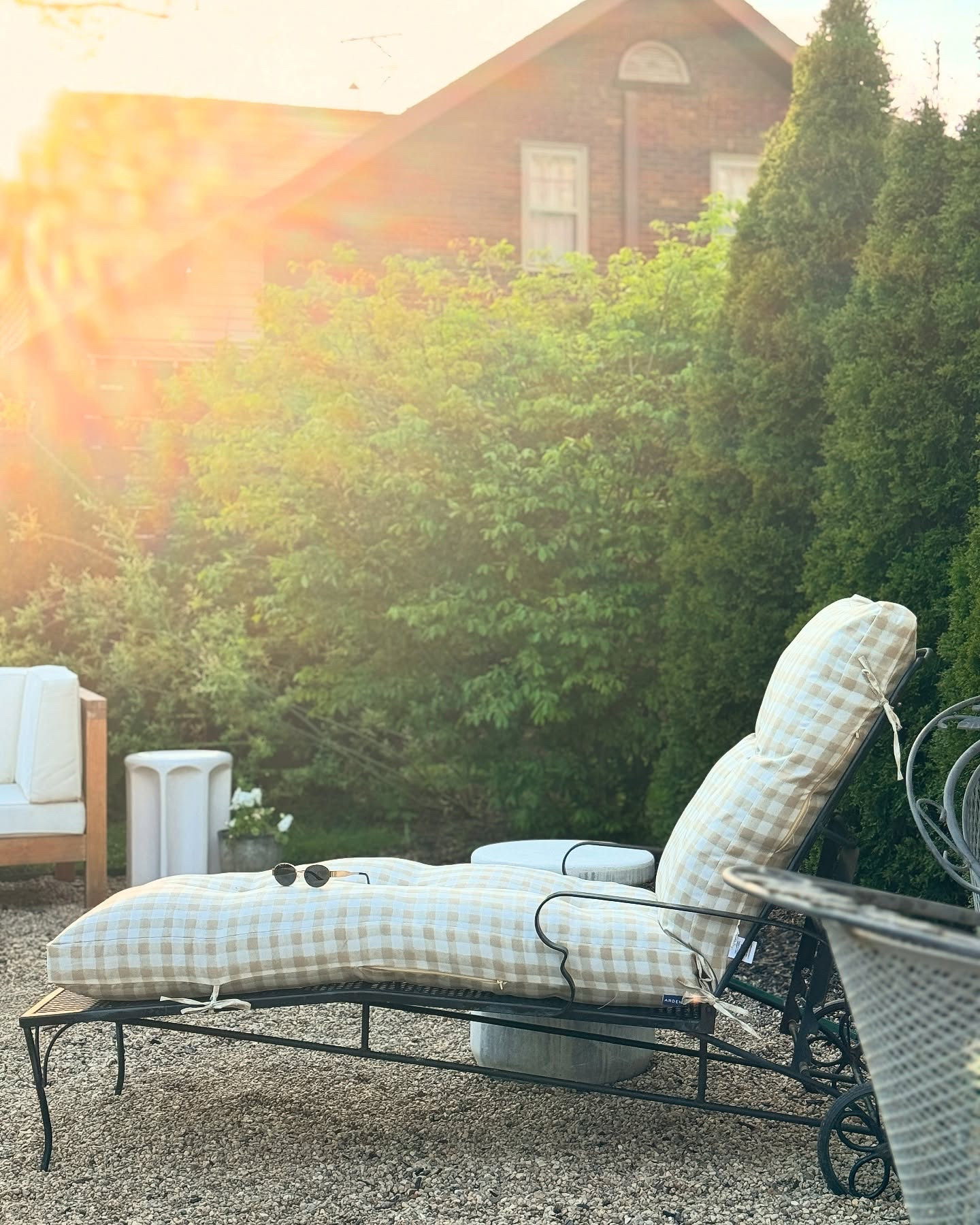 A moment for my latest @facebook marketplace find 🫶 this wrought iron chaise for $50 + new cushion from @walmart is going to my mvp this summer. I rearranged the back patio a bit and I’m loving how it feels. Just a little reminder that it doesn’t take big bucks or an overhaul for something to feel fresh again!