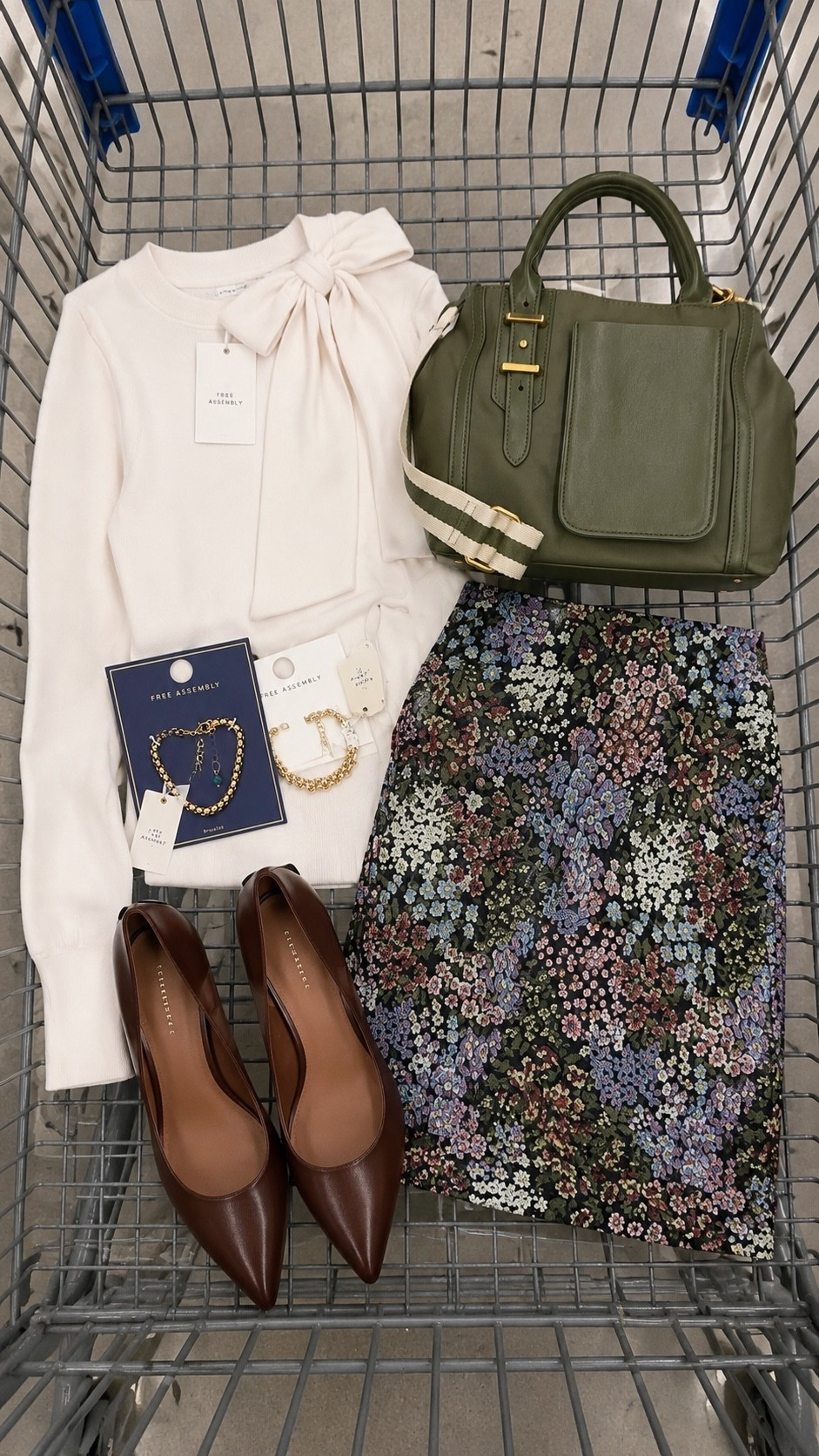 This one feels so polished without being overly dressy. The bow-detail sweater + floral skirt + brown pumps are such a pretty combo, and that olive bag gives it just enough contrast. ✨

#LTKgrwm #LTKootd