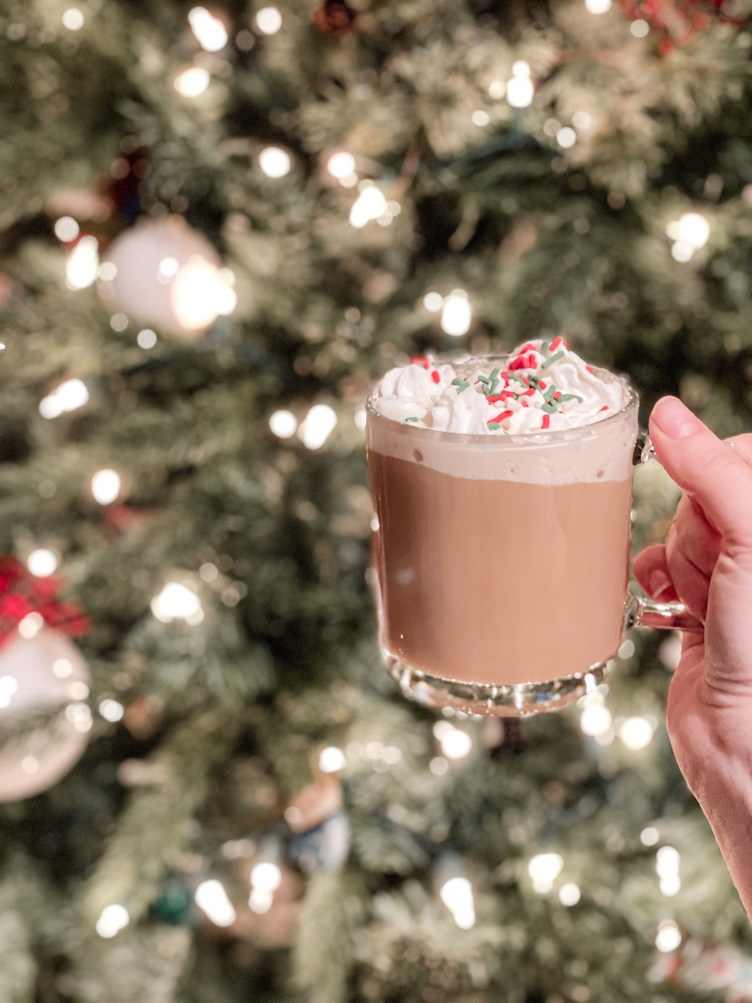 Christmas coffee, anyone? The perfect reason to add whipped topping and sprinkles to your coffee. I am loving these glass mugs!! They would make the perfect gift this holiday season  

#coffeemug #glasscoffeemug #coffee #starbucksathome 

#LTKhome #LTKGiftGuide #LTKHoliday