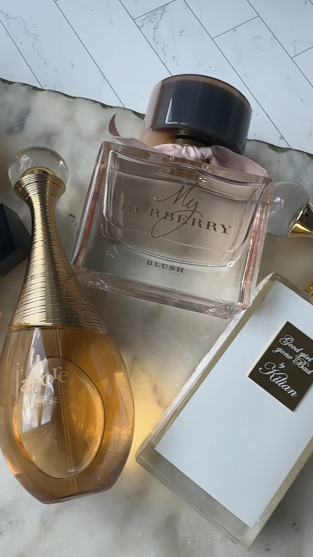 ✨ Perfume tray goals featuring some of my favorite luxury fragrances! From Marc Jacobs Daisy Eau So Intense to Burberry Her and YSL Libre, these feminine perfumes are perfect for smelling expensive all day. 

#LuxuryPerfume #PerfumeCollection #FragranceLover #DesignerPerfume #MarcJacobsDaisy #BurberryHer #YSLLibre #PerfumeAesthetic #BeautyFavorites ✨

#LTKBeauty #LTKWedding #LTKBeauty #LTKWorkwear