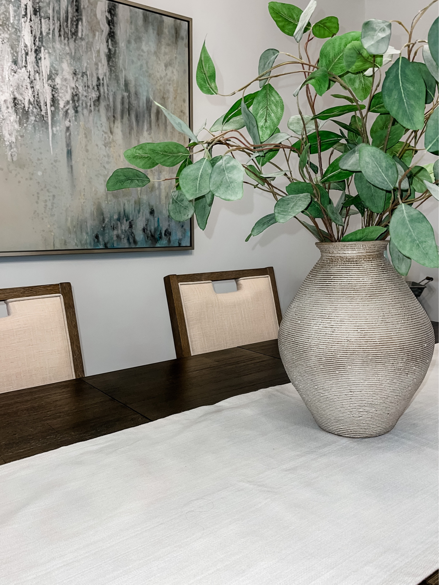 A dining room with a statement centerpiece and dining table! 

#LTKhome #LTKstyletip #LTKfamily