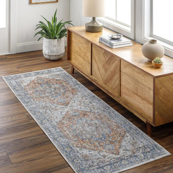 Bejarano Kirklin Oriental Machine Woven Polyester Area Rug in Dark Blue/Rust | Wayfair North America
