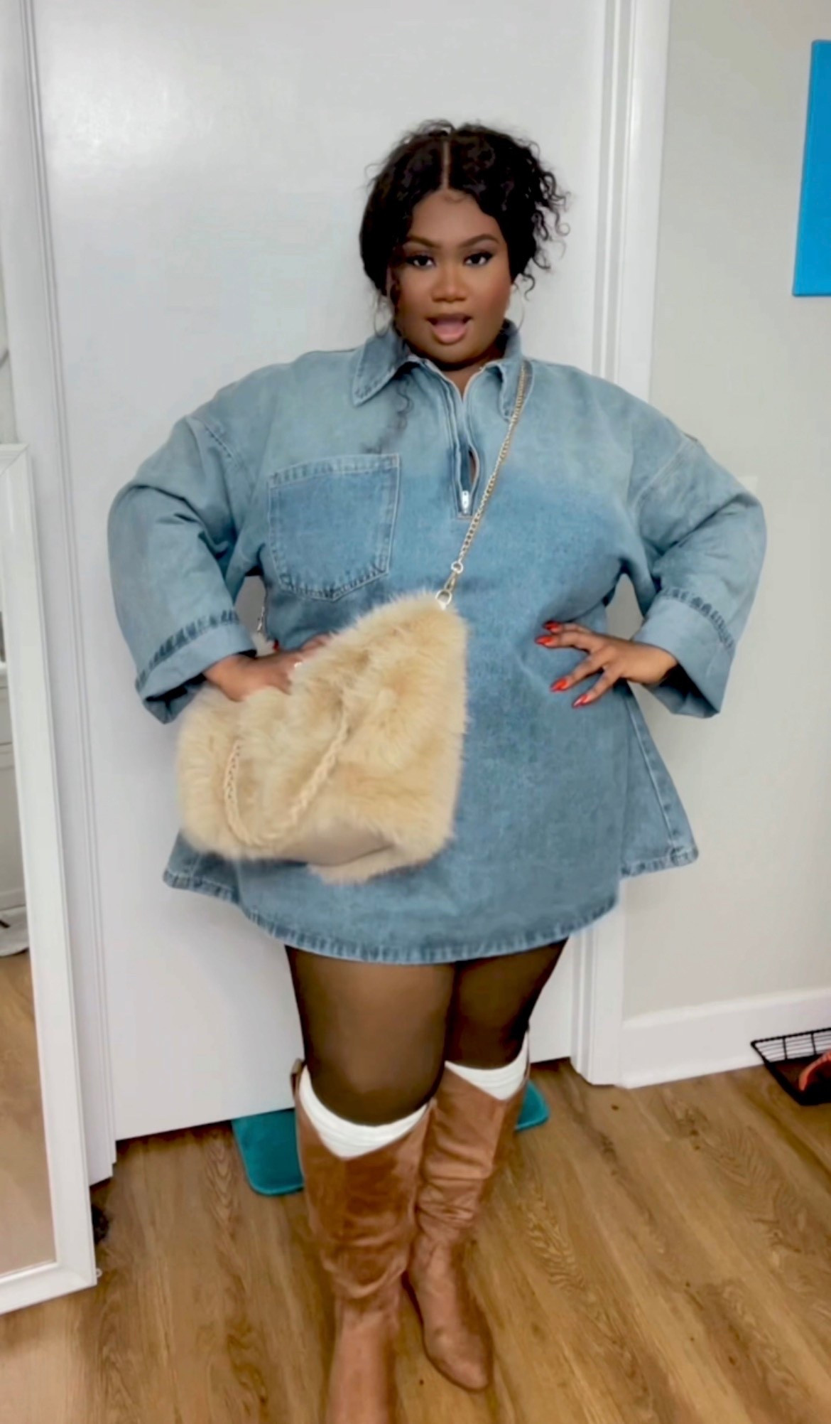 One of my favorite ways to style my favorite oversized denim dress is keeping the colors neutral.
Blue denim with tan boots, cable-knit socks, and a khaki fur purse keeps the look cohesive and easy.

#LTKootd #LTKPlusSize #LTKHoliday