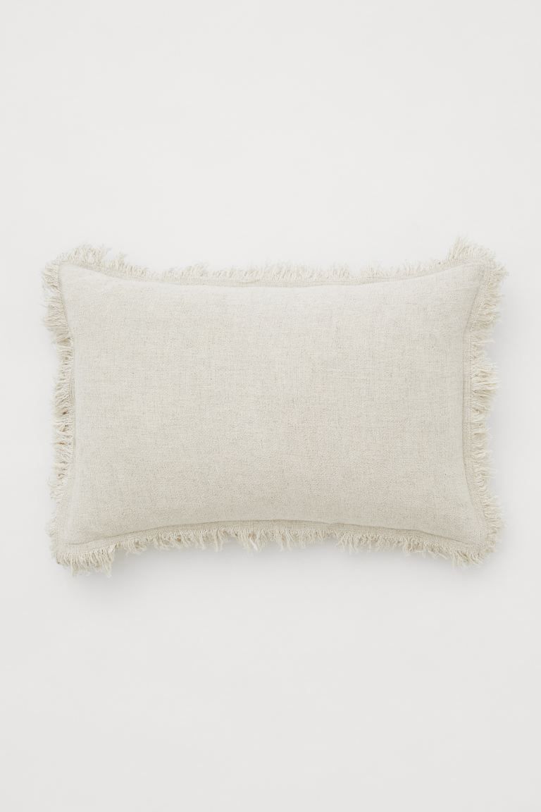 Cushion cover in a woven linen, cotton, and viscose blend with a timeless feel. Fringe at sides a... | H&M (US + CA)